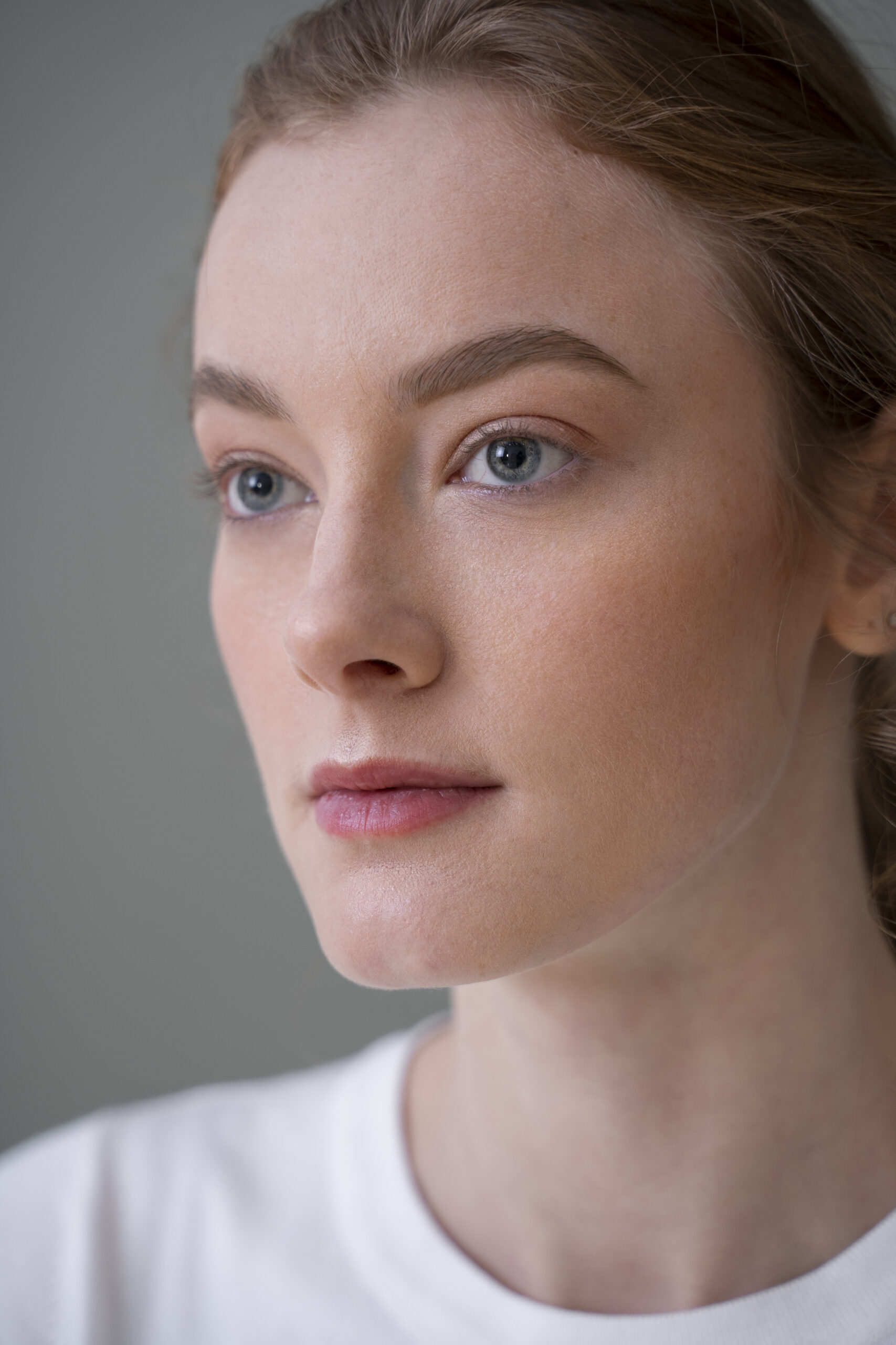 beautiful woman wearing minimalist shirt scaled