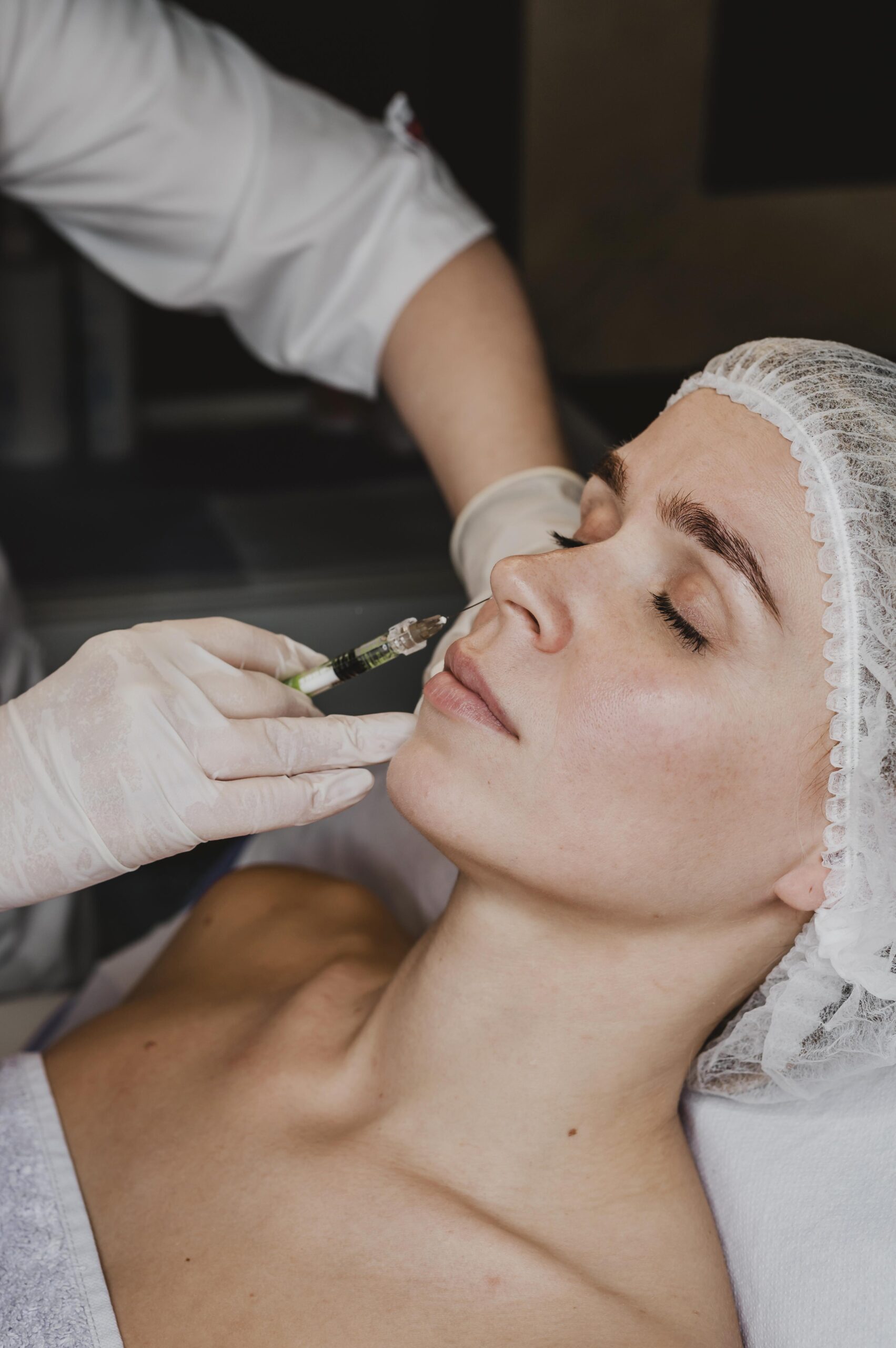 woman getting facial beauty treatment spa scaled